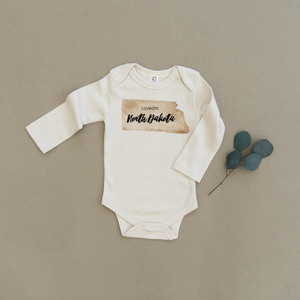 Loved in North Dakota Organic Baby Onesie®