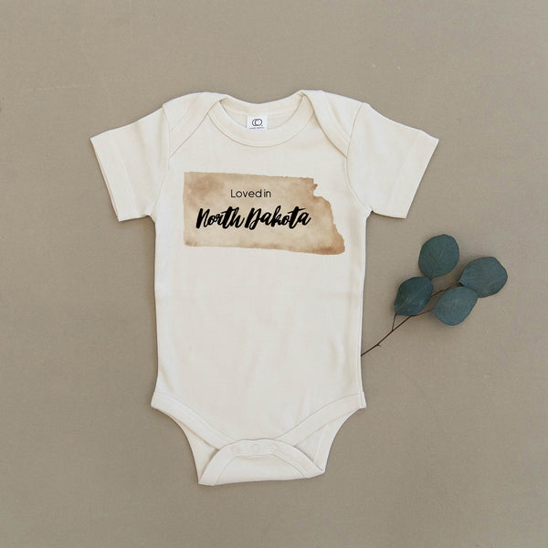 Loved in North Dakota Organic Baby Onesie®